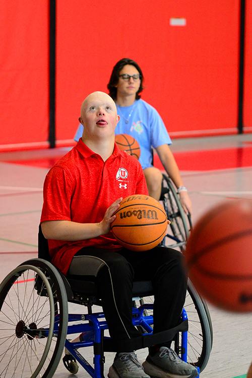 male playing wheelchair basketball